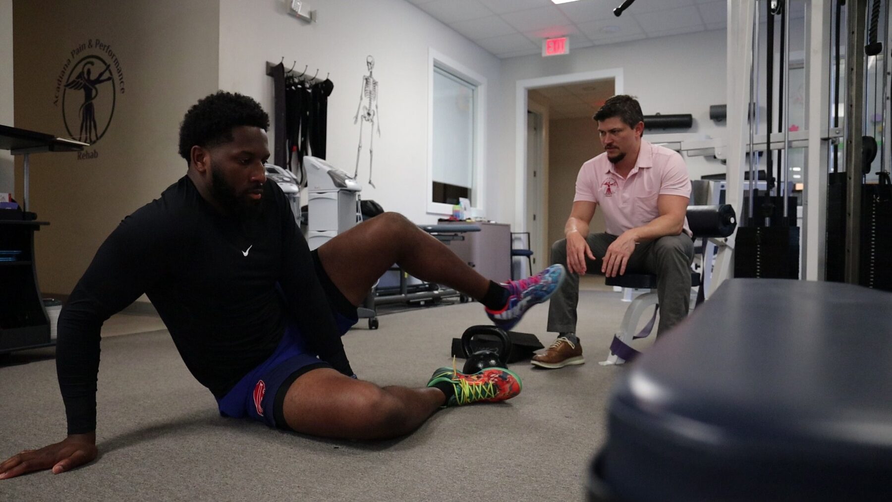 Athlete working through a rehabilitation program in the gym